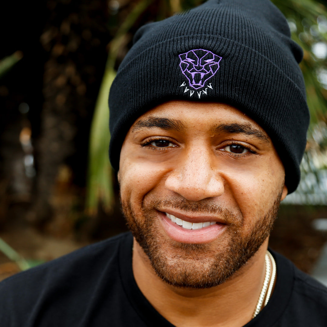Man wearing Black Panther ribbed cuffed beanie.